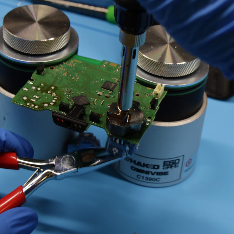 Controller circuit board during removal of a joystick module